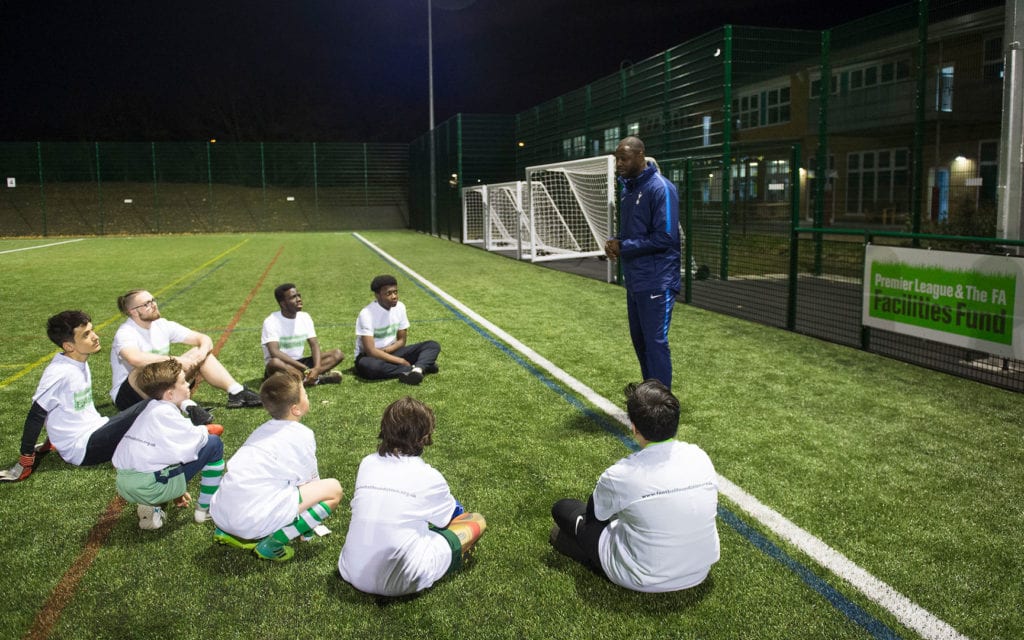 Ledley King talks to children at the launch of 3G Sports Pitch
